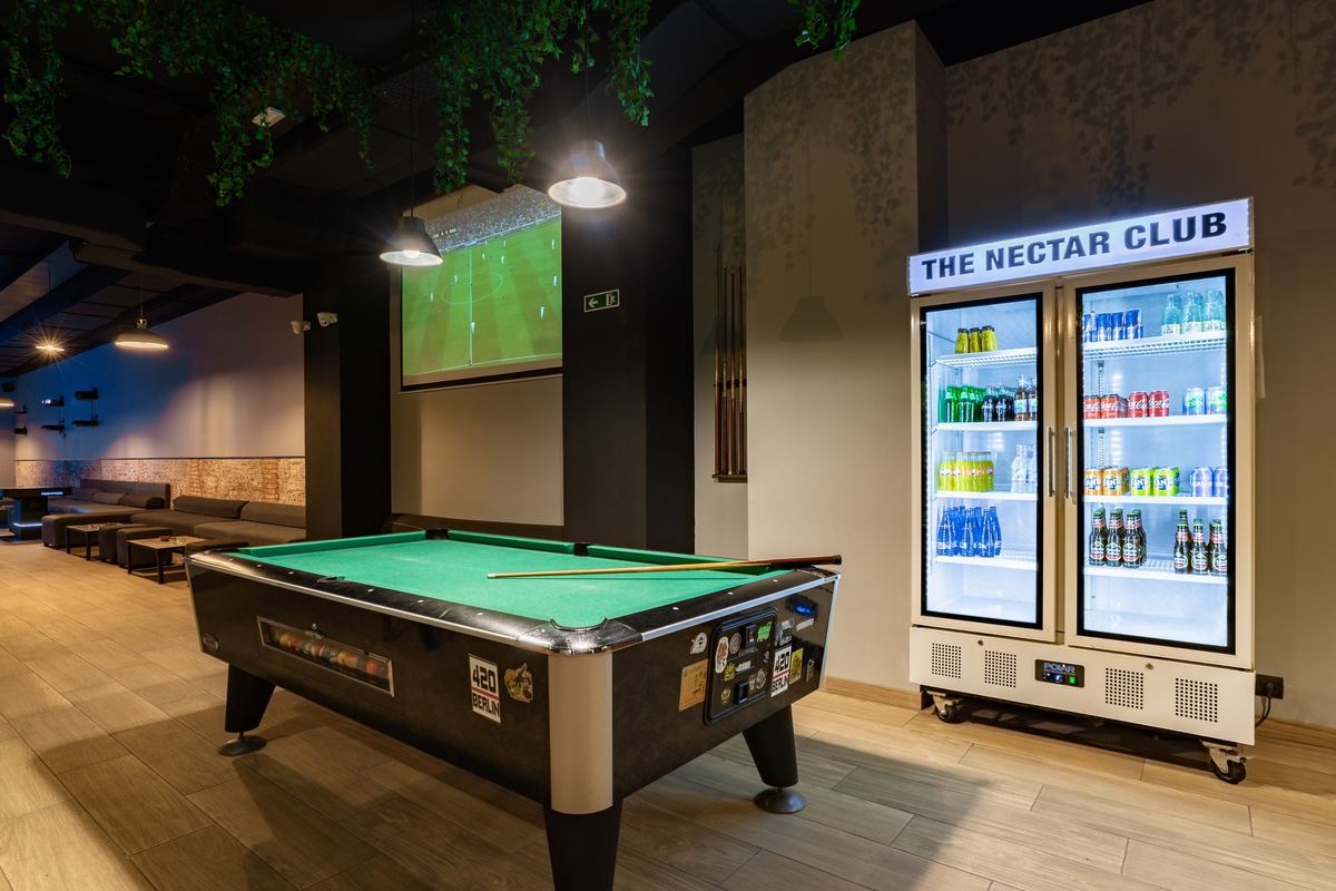 Pool table and the drinks fridge